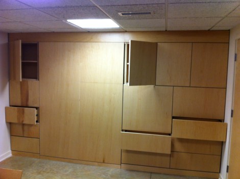 All doors and drawers are touch latch - no pulls